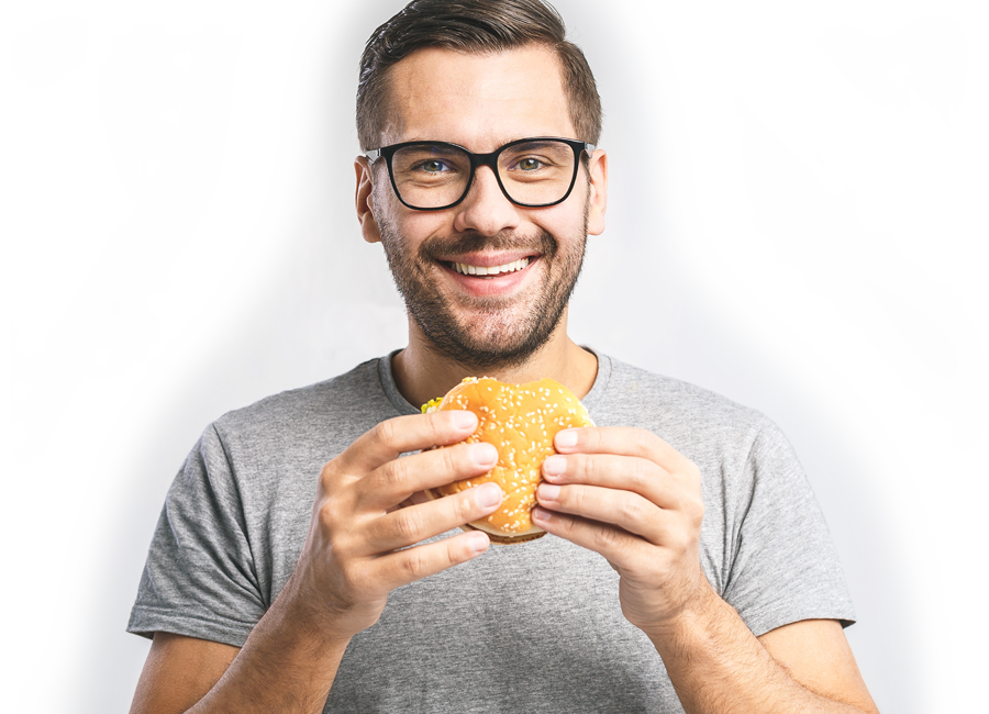 happy man eating veggie burger